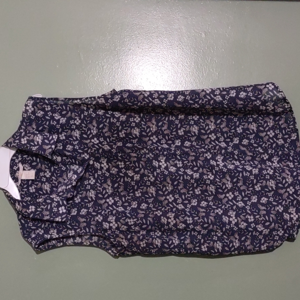 Button down sleeveless shirt